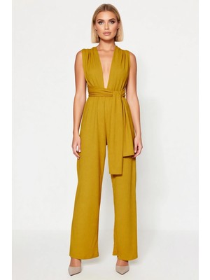 Benerly Kadın V Yaka Kolsuz Dokuma Bürümcük Kumaş Kuşaklı Yırtmaç Detaylı Geniş Paça Relaxed Kalıp Tulum