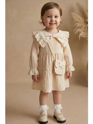 Minipodyum Fiyonk Detaylı Çantalı Bayramlık Müslin Kız Bebek Elbise