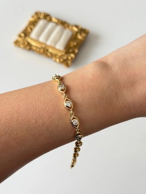 Çelik Gold Zirkon Göz Bileklik