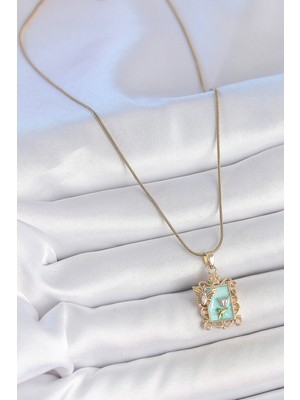 Aesco 316L Çelik Gold Renk Zincir Mavi Mineli Çiçek Işlemeli Zirkon Taşlı Kelebek Detay Portre Model Kadın Kolye - Lisinya