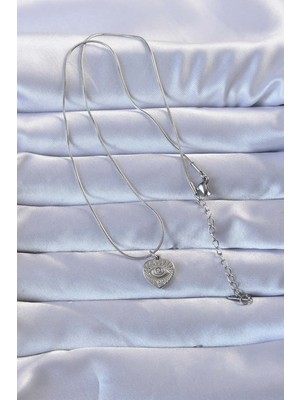 Aesco 316L Gümüş Renk Zirkon Taşlı Işlemeli Göz Detay Kalp Kolye - Lisinya