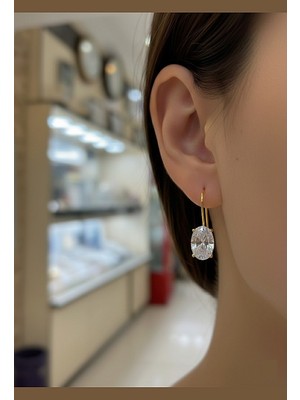 Erer Gümüş Gümüş Oval 12X8 mm 4,5 Carat Sallantılı Altın Kaplama Tektaş Küpe
