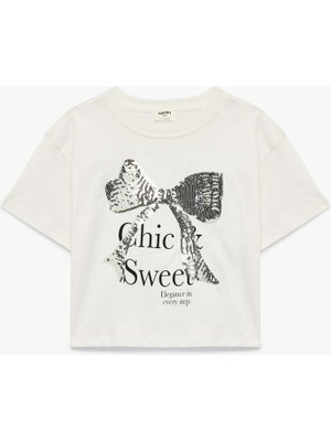Koton Pullu Payetli Fiyonklu Ekru Kız Çocuk T-Shirt 6SKG10195AK