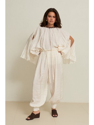 Setre Krem Belden Lastikli Bağlama ve Paça Detaylı Rahat Kalıp Pantolon