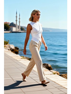 Benerly Kadın Bluz Bisiklet Yaka Kolsuz Asimetrik Fitted Kesim Örme Kumaş Düz Desen Regular Boy Şık