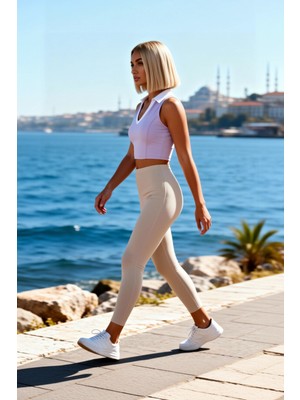 Benerly Kadın Bluz Spor Crop Polo Yaka Kolsuz Dalgıç Scuba Örme Kumaş Regular Kalıp Düz Desen Kısa Kesim