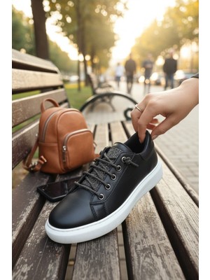 Enoch Kadın Metal Detaylı ve Simli Bağcıklı Spor Ayakkabıenoch Kadın Metal Kuşgözü Detaylı ve Simli Bağcıklı Spor Ayakkabı