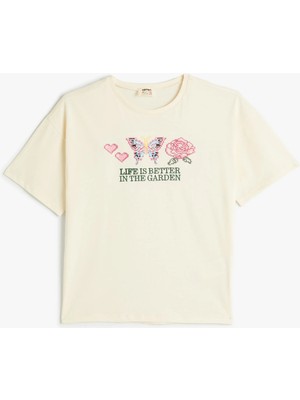 Koton Kız Çocuk Tişört Slogan Temalı Kısa Kollu Ekru Baskılı Bisiklet Yaka Şık Tasarım