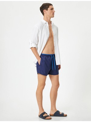 Koton Kısa Deniz Şortu File Astarlı Beli Bağlamalı Cepli Rahat Kalıp