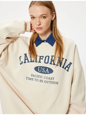 Koton Oversize Sweatshirt Kolej Baskılı Uzun Kollu Bisiklet Yaka Şardonlu