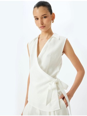 Koton Yandan Bağlama Detaylı Viskon Kolsuz Kruvaze Bluz