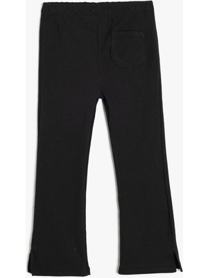 Koton Basic Ispanyol Paça Tayt Tek Cepli Ribanalı Yırtmaç Detaylı