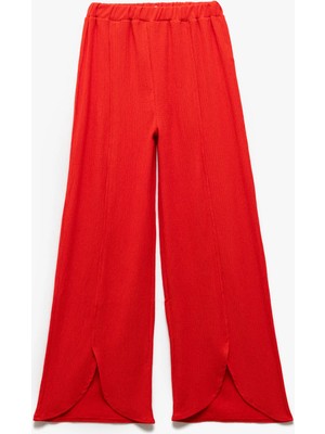 Koton Yırtmaç Detaylı Beli Lastikli Kız Çocuk Dokulu Palazzo Pantolon Polyester Karışımlı