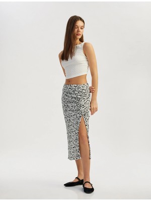 Koton Yüksek Bel Drapeli Yırtmaç Detaylı Çiçekli Midi Etek