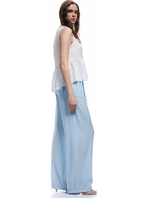 Koton x Melis Ağazat - Astarlı Viskon Kumaş Pile Detaylı Cepli  Palazzo Pantolon