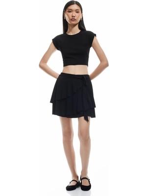 Koton Asimetrik Bağlama Detaylı Katlı Fırfırlı Mini Etek