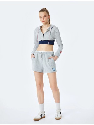 Koton Çift Bel Detaylı Bağcıklı Etiket Baskılı Cepli Mini Spor Şort