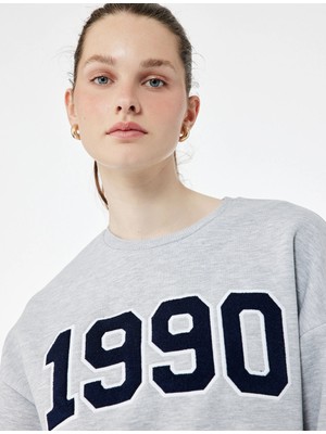 Koton Üç Iplik Şardonlu Uzun Kollu Bisiklet Yaka Nakışlı Crop Sweatshirt