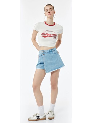Koton Pamuklu Düğme Detaylı Cepli Asimetrik Mini Denim Şort Etek