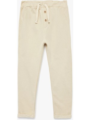 Şardonlu Pamuklu Cepli Düğme Detaylı Beli Bağcıklı Pantolon