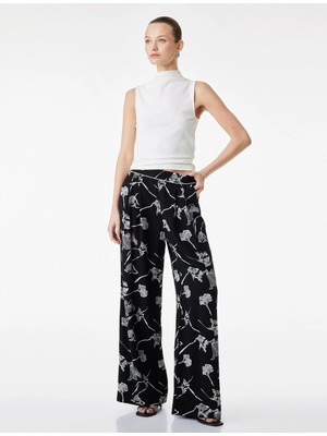 Koton Viskon Keten Karışımlı Pile Detaylı Geniş Paça Çiçekli Pantolon