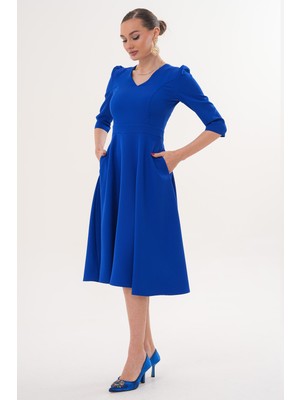 Ruris Kadın Saks Mavi V Yaka Cepli Truvakar Kol Midi Kloş Double Kumaş Elbise