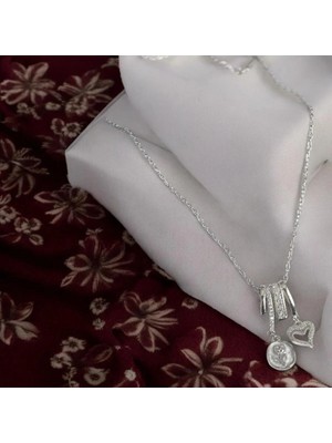 Rafiel Romantik Detaylar: Gül ve Kalp Detaylı Zirkon Taşlı Gümüş Çelik Kolye