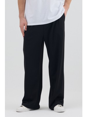 Moviment Siyah Dalgıç Kumaş Şardonlu Önü Pile ve Cep Detaylı Rahat Kesim Baggy Pantolon