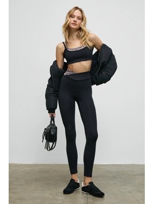 Urban Beat JULSEN Kadın Yumuşak Ve Esnek Dokulu Asimetrik Konstrat Bel Detaylı Siyah Tayt