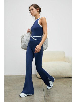 Urban Beat GLIPSEN Kadın Yumuşak Ve Esnek Dokulu Kontrast Biyeli Asimetrik Kemerli İspanyol Paça Lacivert Tayt