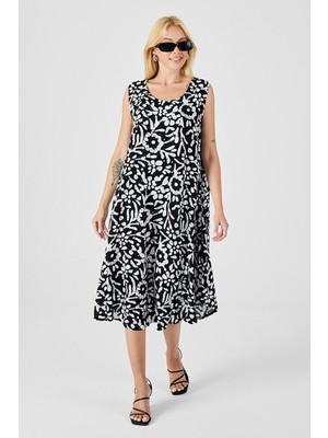 Bacc Siyah-Beyaz U Yaka Kolsuz Eteği Asimetrik Kesim Desenli Midi Boy Elbise BCVL-254016