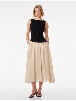 Koton Viskon Kumaş Pile Detaylı Cepli Çan Kesim Midi Etek