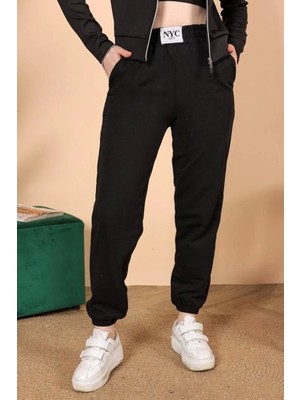 Kuzgun Ticaret Rahatlığın Şıklığı Tarz Siyah Paçası Lastikli Eşofman Altı ( Lisinya )