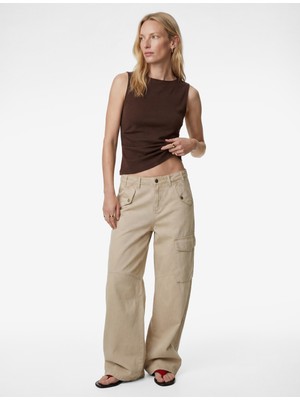 Koton Pamuklu Asimetrik Kesim Kolsuz Kayık Yaka Bluz