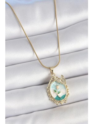 Inure Jewelry 316L Çelik Gold Renk Zincir Mavi Mineli Çiçek İşlemeli Zirkon Taş Detaylı Portre Model Kadın Kolye