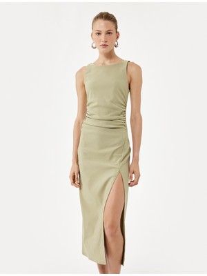 Koton Slim Fit Kolsuz Bisiklet Yaka Drape Detaylı Midi Boy Yırtmaçlı Elbise