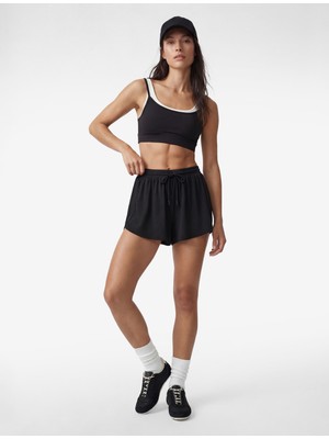 Koton Kadın Yüksek Bel Yırtmaç Detaylı Lastikli Mini Spor Şort Desensiz Regular Fit