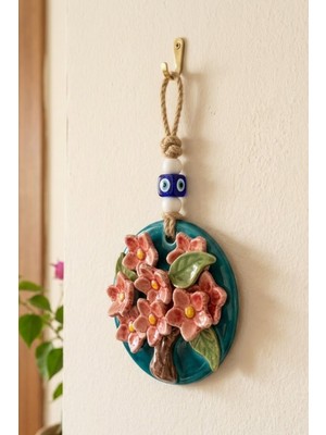 Nazar Boncuklu Çiçek Figürlü Dekoratif Duvar Süsü – Turkuaz Renkli Askılı Duvar Dekoru