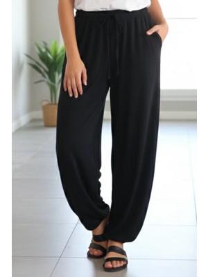 Beli Lastikli Paçası Detaylı Şalvar Pantolon