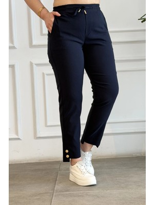 Beli Lastikli Paçası Asimetrik Pantolon