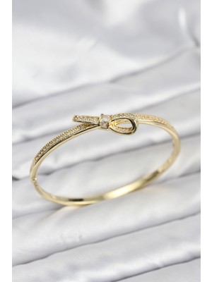 Pileli Store Pirinç Gold Renk Zirkon Taşlı Fiyonk Model Kadın Kelepçe Bileklik