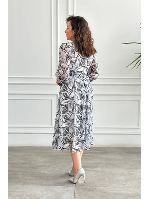 V Yaka Pile Detaylı Desenli Elbise
