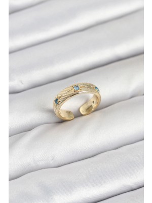 Pileli Store Pirinç Gold Renk Mavi Zirkon Taşlı Kutup Yıldızı Model Kadın Yüzük