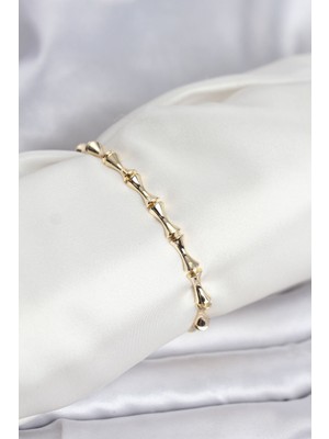 Inure Jewelry Pirinç Gold Renk VIP Seri Kemik Model Zirkon Taşlı Kadın Bileklik