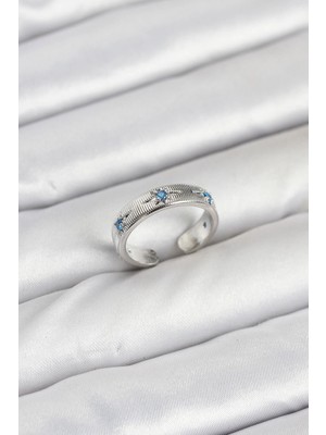 Nexgen Pirinç Gümüş Renk Mavi Zirkon Taşlı Kutup Yıldızı Model Kadın Yüzük