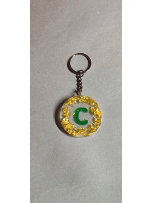 Miina Aksesuar altın varak detaylı el yapımı dekoratif bir görünüm sunan epoksi reçine anahtarlıktır.