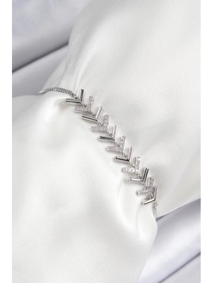 Buğz Pirinç Zirkon Taşlı Sıralı Ok Model Gümüş Renk Asansörlü Kadın Bileklik