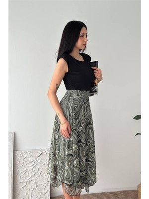 Neşeli Butik Kadın Yeşil Modern Kesim Vatkalı Asimetrik Kesim Mermer Desen Elbise NBK4593