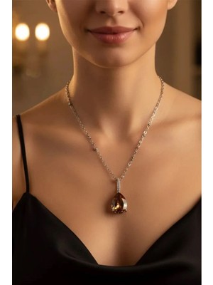 Gümüş Renk Sıra Taşlı Amber Damla Model Çelik Kolye