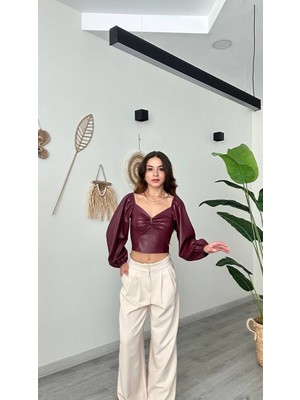 Şamdan Şık ve Çarpıcı Deri Görünümlü Büzgü Detaylı Bluz